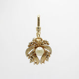 Vintage 1980's Glowy Pearl Enveloped Golden Charm