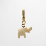 Hand Carved Bone Trunks-Up Elephant Buttercup Charm