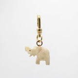 Hand Carved Bone Trunks-Up Elephant Buttercup Charm